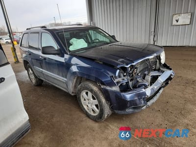 Czwarte zdjęcie samochodu z boku: 2009 JEEP GRAND CHEROKEE LAREDO VIN:1J8GR48K89C552089 - miniatura