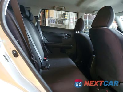Zdjęcie 11 z 13 samochodu: 2010 TOYOTA SCION VIN:JTLZE4FEXA1107785 - miniatura