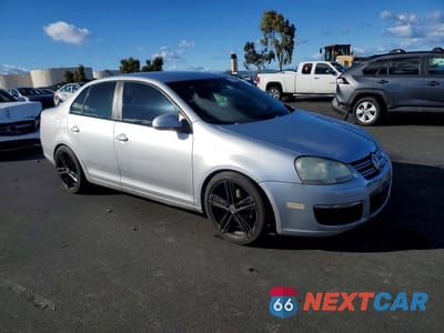 Czwarte zdjęcie samochodu z boku: 2006 VOLKSWAGEN JETTA VALUE VIN:3VWPG71K06M641543 - miniatura