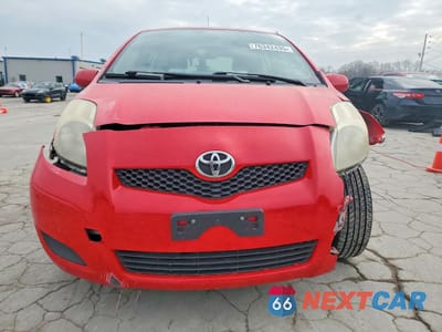 Piąte zdjęcie samochodu w środku: 2011 TOYOTA YARIS BASE VIN:JTDKT4K31B5340228 - miniatura