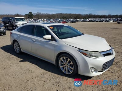 Czwarte zdjęcie samochodu z boku: 2014 TOYOTA AVALON BASE VIN:4T1BK1EB6EU104409 - miniatura