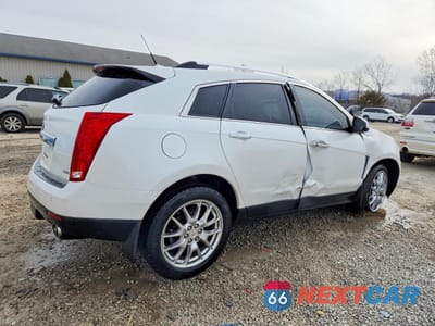 Trzecie zdjęcie samochodu z tyłu: 2014 CADILLAC SRX PREMIUM COLLECTION VIN:3GYFNGE36ES528773 - miniatura