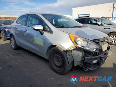 Czwarte zdjęcie samochodu z boku: 2012 KIA RIO LX VIN:KNADM5A34C6013652 - miniatura