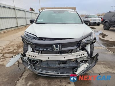 Piąte zdjęcie samochodu w środku: 2022 HONDA PILOT TRAILSPORT VIN:5FNYF6H82NB062944 - miniatura