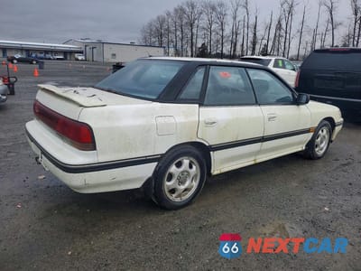 Trzecie zdjęcie samochodu z tyłu: 1993 SUBARU LEGACY SPORT VIN:JF1BC6734PG602538 - miniatura