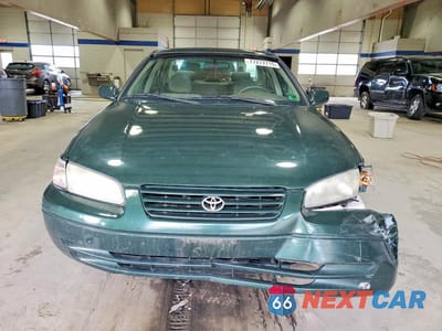 Piąte zdjęcie samochodu w środku: 1999 TOYOTA CAMRY CE VIN:4T1BG22K5XU413321 - miniatura