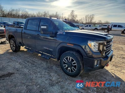 Czwarte zdjęcie samochodu z boku: 2020 GMC SIERRA K2500 AT4 VIN:1GT49PEY2LF150496 - miniatura
