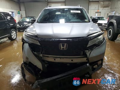 Piąte zdjęcie samochodu w środku: 2019 HONDA PASSPORT TOURING VIN:5FNYF8H92KB000525 - miniatura