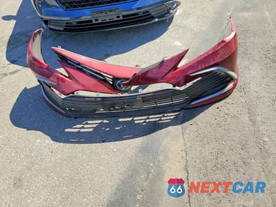 Zdjęcie 12 z 13 samochodu: 2021 TOYOTA CAMRY HYBRID LE VIN:4T1C31AK3MU022434 - miniatura