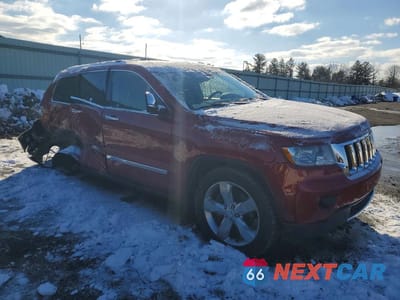 Czwarte zdjęcie samochodu z boku: 2011 JEEP GRAND CHEROKEE OVERLAND VIN:1J4RR6GT8BC605704 - miniatura