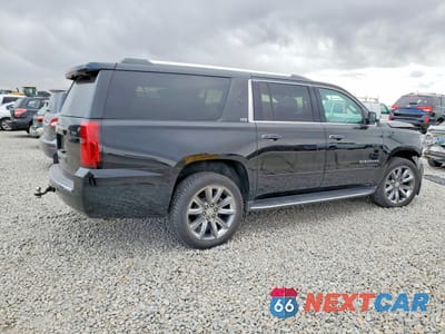 Trzecie zdjęcie samochodu z tyłu: 2016 CHEVROLET SUBURBAN K1500 LTZ VIN:1GNSKJKC0GR329200 - miniatura