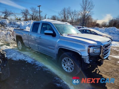 Czwarte zdjęcie samochodu z boku: 2017 GMC SIERRA K1500 SLE VIN:1GTV2MEC2HZ130489 - miniatura