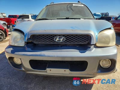 Piąte zdjęcie samochodu w środku: 2004 HYUNDAI SANTA FE GLS VIN:KM8SC13EX4U726410 - miniatura