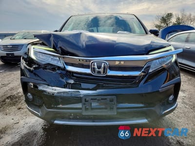 Piąte zdjęcie samochodu w środku: 2019 HONDA PILOT TOURING VIN:5FNYF6H92KB033531 - miniatura
