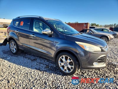 Czwarte zdjęcie samochodu z boku: 2015 FORD ESCAPE TITANIUM VIN:1FMCU9J96FUC82399 - miniatura