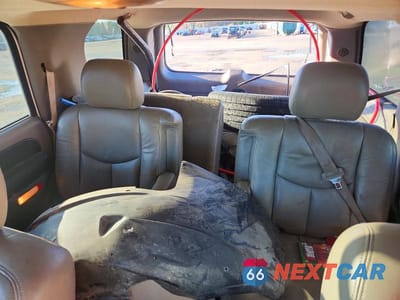 Zdjęcie 10 z 13 samochodu: 2003 CHEVROLET TAHOE C1500 VIN:1GNEC13ZX3J102246 - miniatura