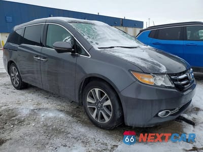 Czwarte zdjęcie samochodu z boku: 2017 HONDA ODYSSEY TOURING VIN:5FNRL5H91HB016137 - miniatura