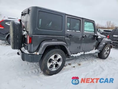 Trzecie zdjęcie samochodu z tyłu: 2017 JEEP WRANGLER UNLIMITED SAHARA VIN:1C4BJWEG6HL668068 - miniatura