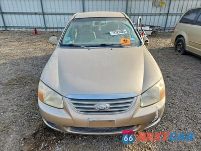 Piąte zdjęcie samochodu w środku: 2007 KIA SPECTRA VIN:KNAFE121575434528 - miniatura