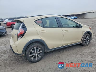 Trzecie zdjęcie samochodu z tyłu: 2018 TOYOTA PRIUS C TWO VIN:JTDKDTB33J1616504 - miniatura