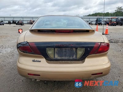 Zdjęcie 6 z 11 samochodu: 1998 PONTIAC SUNFIRE SE VIN:1G2JB1244W7538113 - miniatura