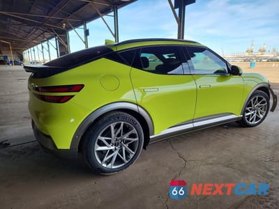 Trzecie zdjęcie samochodu z tyłu: 2023 GENESIS GV60 ADVANCED VIN:KMUKCDTC4PU014612 - miniatura