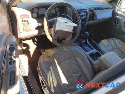 Zdjęcie 8 z 13 samochodu: 2003 JEEP GRAND CHEROKEE LIMITED VIN:1J4GW58N93C594434 - miniatura