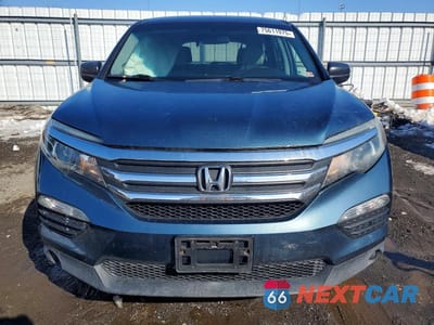 Piąte zdjęcie samochodu w środku: 2016 HONDA PILOT LX VIN:5FNYF6H11GB110441 - miniatura