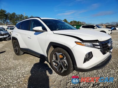 Czwarte zdjęcie samochodu z boku: 2023 HYUNDAI TUCSON SEL VIN:5NMJF3AE6PH250769 - miniatura