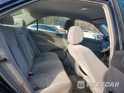 Zdjęcie 10 z 11 samochodu: 2004 TOYOTA CAMRY LE VIN:JTDBE32K140272444 - miniatura