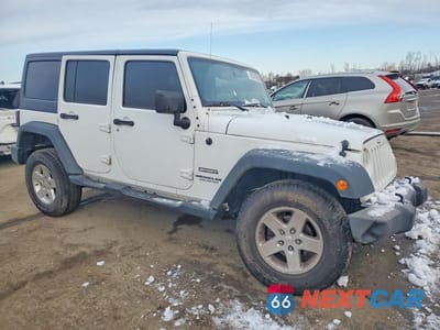 Czwarte zdjęcie samochodu z boku: 2016 JEEP WRANGLER UNLIMITED SPORT VIN:1C4BJWDG0GL311310 - miniatura