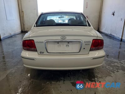 Zdjęcie 6 z 11 samochodu: 2002 HYUNDAI SONATA GLS VIN:KMHWF35H72A685874 - miniatura