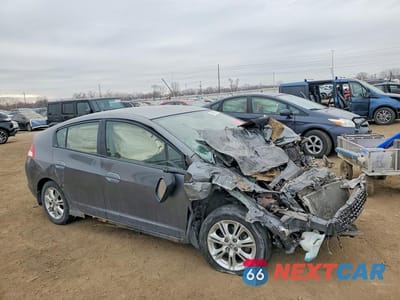 Czwarte zdjęcie samochodu z boku: 2010 HONDA INSIGHT EX VIN:JHMZE2H77AS002547 - miniatura