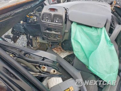 Zdjęcie 8 z 12 samochodu: 2002 HYUNDAI ACCENT GL VIN:KMHCG45C32U353942 - miniatura