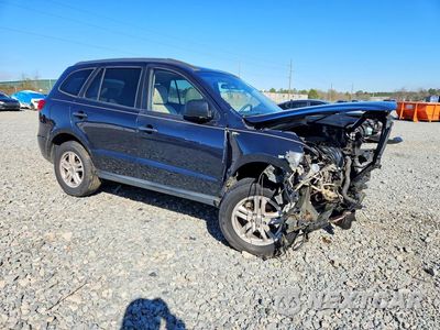Czwarte zdjęcie samochodu z boku: 2010 HYUNDAI SANTA FE GLS VIN:5NMSG3AB2AH409141 - miniatura