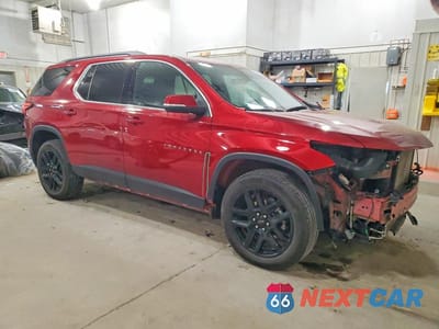 Czwarte zdjęcie samochodu z boku: 2023 CHEVROLET TRAVERSE LT VIN:1GNEVGKW9PJ140335 - miniatura