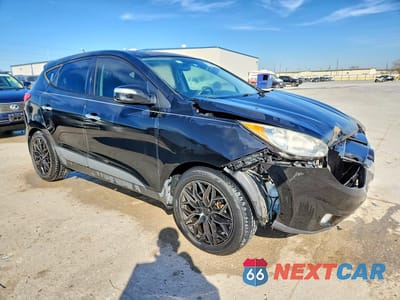 Czwarte zdjęcie samochodu z boku: 2011 HYUNDAI TUCSON LIMITED VIN:KM8JU3AC1BU210777 - miniatura