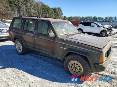 Czwarte zdjęcie samochodu z boku: 1992 JEEP CHEROKEE SPORT VIN:1J4FJ88S3NL116305 - miniatura