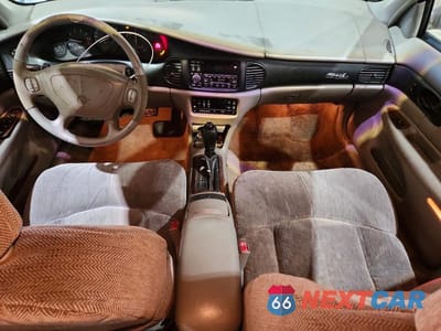 Zdjęcie 8 z 11 samochodu: 1999 BUICK REGAL LS VIN:2G4WB52K6X1625402 - miniatura