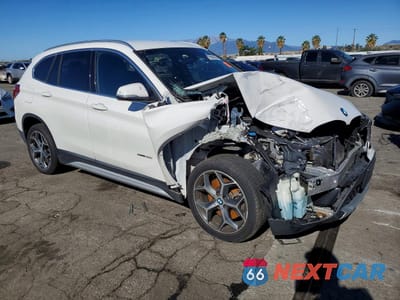 Czwarte zdjęcie samochodu z boku: 2018 BMW X1 SDRIVE28I VIN:WBXHU7C34J5H40120 - miniatura