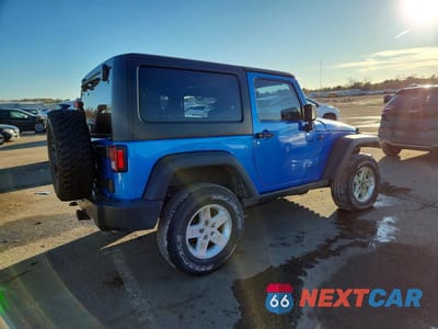 Trzecie zdjęcie samochodu z tyłu: 2016 JEEP WRANGLER SPORT VIN:1C4AJWAG2GL165802 - miniatura