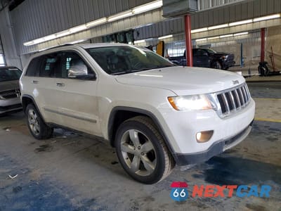 Czwarte zdjęcie samochodu z boku: 2013 JEEP GRAND CHEROKEE LIMITED VIN:1C4RJFBG1DC520133 - miniatura