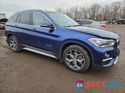 Czwarte zdjęcie samochodu z boku: 2017 BMW X1 XDRIVE28I VIN:WBXHT3C39H5F84579 - miniatura
