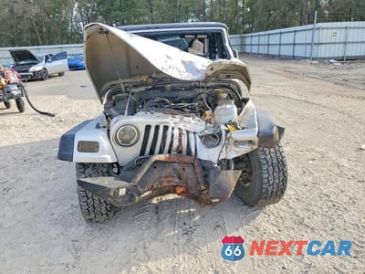 Piąte zdjęcie samochodu w środku: 2004 JEEP WRANGLER / TJ SPORT VIN:1J4FA49S54P723627 - miniatura