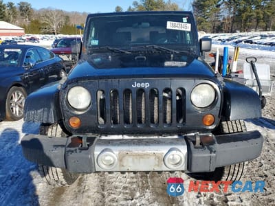Piąte zdjęcie samochodu w środku: 2010 JEEP WRANGLER SAHARA VIN:1J4AA5D19AL137210 - miniatura