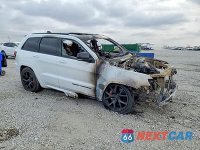 Czwarte zdjęcie samochodu z boku: 2016 JEEP GRAND CHEROKEE SRT-8 VIN:1C4RJFDJ2GC413475 - miniatura