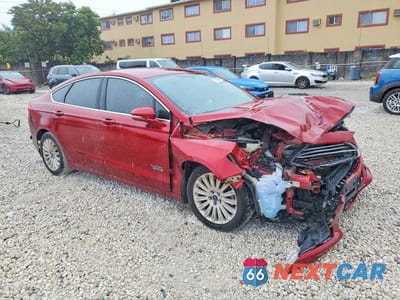 Czwarte zdjęcie samochodu z boku: 2016 FORD FUSION SE PHEV VIN:3FA6P0PU9GR265126 - miniatura