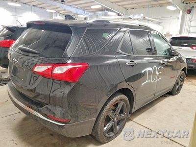 Trzecie zdjęcie samochodu z tyłu: 2021 CHEVROLET EQUINOX PREMIER VIN:2GNAXXEVXM6164079 - miniatura