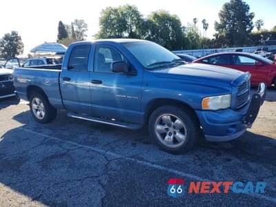 Czwarte zdjęcie samochodu z boku: 2002 DODGE RAM 1500 VIN:1D3HA18NX2J193123 - miniatura