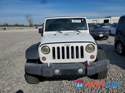 Piąte zdjęcie samochodu w środku: 2011 JEEP WRANGLER VIN:1J4AA2D11BL607875 - miniatura